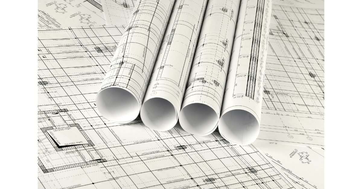 ラフ案(=ドラフト)の書類が複数並んでいる